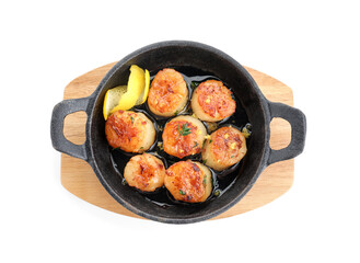 Delicious fried scallops in pan isolated on white, top view