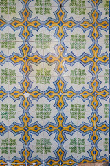 Colorful typical tiles on a wall in Portugal with traditional patterns