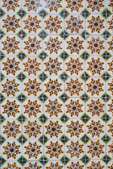 Colorful typical tiles on a wall in Portugal with traditional patterns