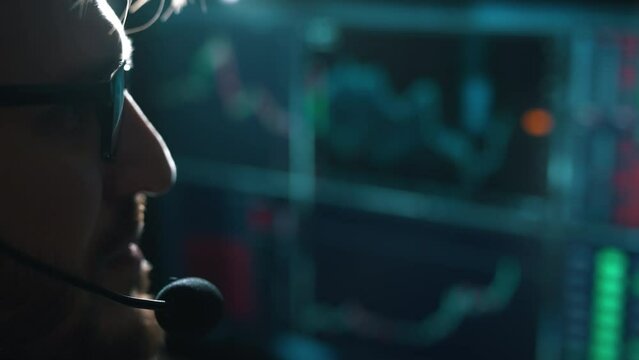 Trader is working with multiple computer screens with charts and data analysis and stock broker trading online. Concept of bitcoin and ethereum blockchain trading. Businessman is checking market data