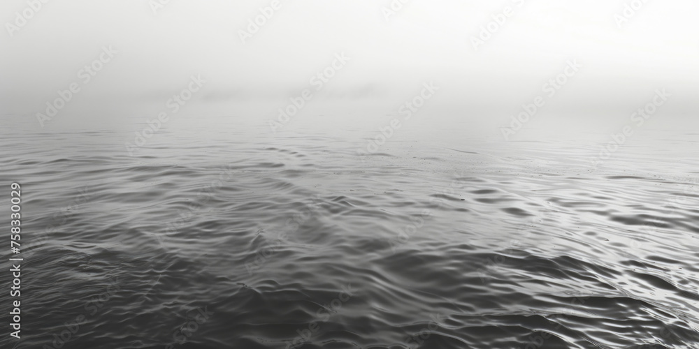 Poster a serene black and white image of a body of water. suitable for various design projects