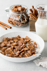 Low carb cinnamon toast crispy cereal, served with milk.