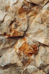 Fototapeta premium A detailed close up of a clock on a rock wall, perfect for time management concepts