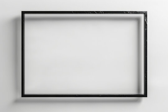Simple black picture frame hanging on a white wall, ideal for interior design projects