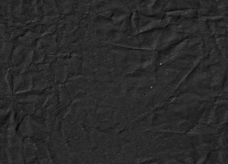 Seamless black crumpled kraft paper texture. Vintage carton surface.