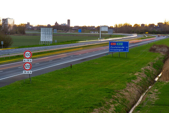 Highway A58 in direction Vlissingen, Oost-Souburg. Speed limits signs, 100 and 120 km/h. Zeeland, The Netherlands