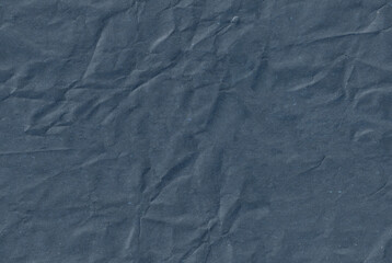 Seamless battered craft blue paper texture. Brown spotted abstract material.