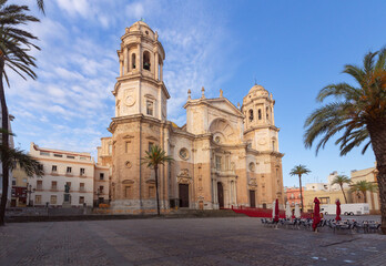 Cathedral of the Holy Cross in the central square of Cadiz at dawn. - 758344831