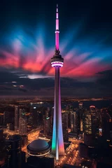Fotobehang Mesmerizing Night View of CN Tower Illuminated by a Vibrant Light Show © Howard