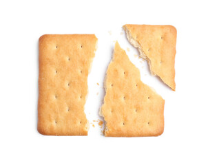 Crispy broken cracker isolated on white, top view