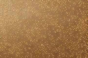 Brown background with golden starry sprinkles dust 