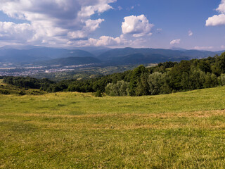 Grassy hill near a Romanian town