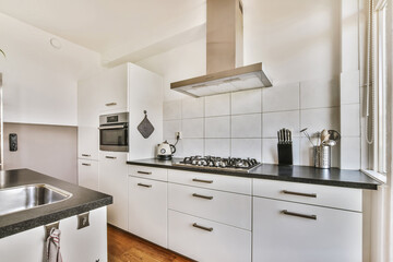 Modern kitchen interior with stainless steel appliances