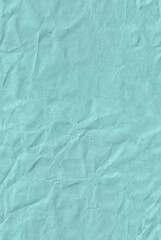 Seamless battered dark sky blue craft paper texture. Brown spotted abstract material. Vertical...