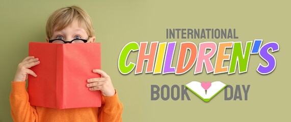 Banner for International Children's Book Day with surprised little boy