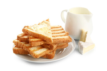 Plate of toasts with butter and camembert on white background