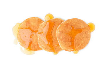 Tasty pancakes maple syrup on white background