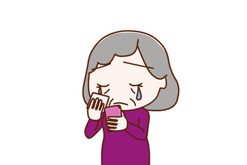 （上半身斜め）スマホを持って画面を見ながら悲しくて涙を流す高齢の女性