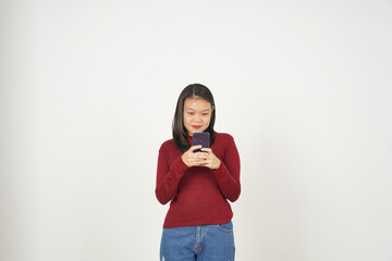 Young Asian woman in Red t-shirt Smile while using smartphone, Texting concept isolated on white background