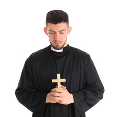 Young priest with cross on white background