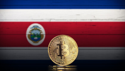Bitcoin BTC representation coin with the national flag of Costa Rica in background.