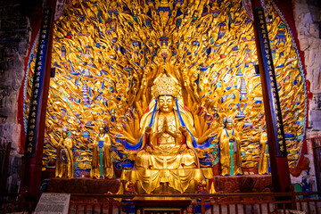 Golden sculpture of Avalokiteshvara Buddha or Guanyin