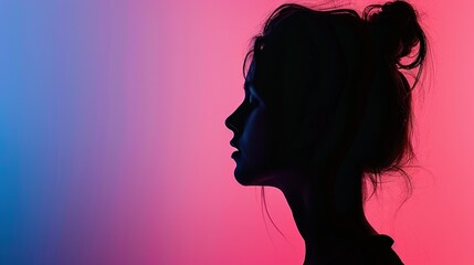 Silhouette of Young Woman Against Gradient Background