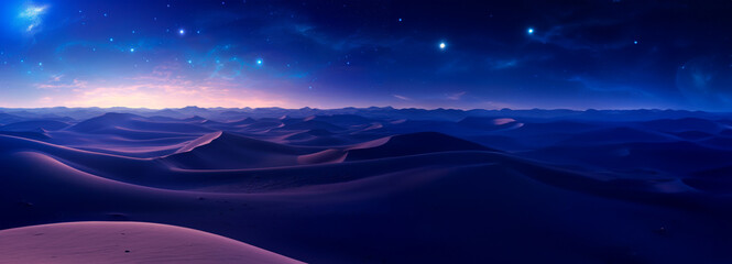Obraz premium Undulating dunes under a cosmic sky, with stars dotting the deep blue expanse and the Milky Way's glow as a backdrop.