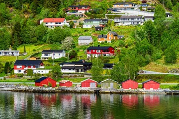 Mountains and Fiord over Norwegian Village, Olden, Innvikfjorden, Norway, Europe - obrazy, fototapety, plakaty