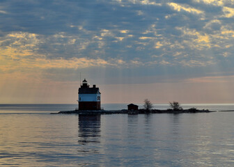 Fototapeta premium Old round island point lighthouse near Petoskey, MI, May