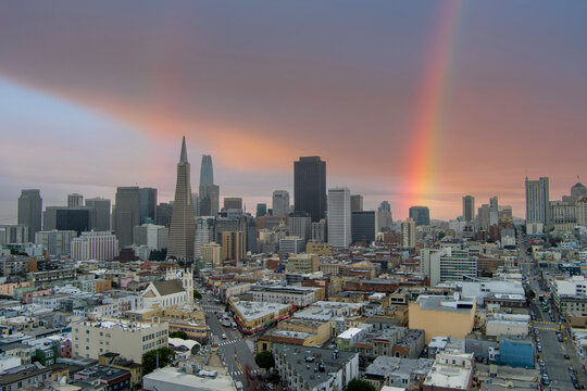 aerial shot of skyscrapers, hotels and office buildings in the city skyline, apartments, condos and cars on the street in San Francisco California USA - Powered by Adobe