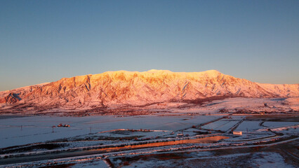 4k Aerial Drone Snow-Capped Mountains Overlooking Willard Bay, Utah