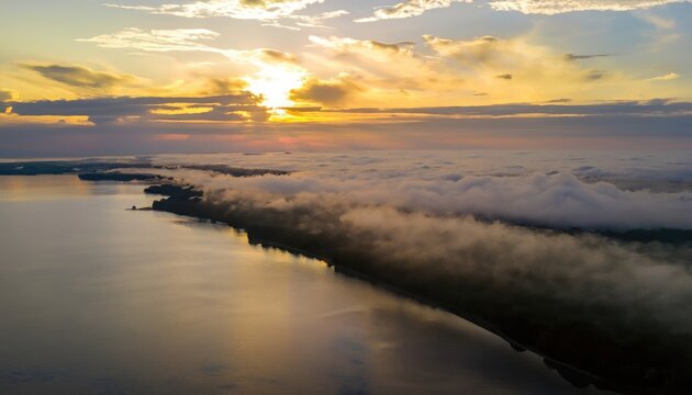 Aerial atmospheric sunrise over the bay with clouds