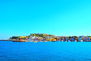 Colorful view at Isola di Procida in the Gulf of Naples on the Tyrrhenian Sea with the pastel...