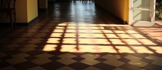 Sunlight casting shadows on tiled flooring.