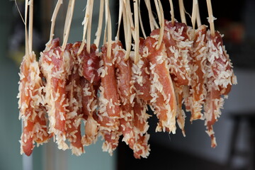 Sundried meat on bamboo strings