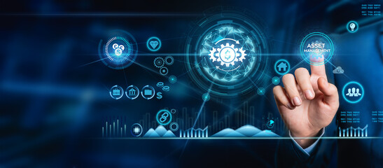 Asset management concept, businessman touches the asset management icon on the business technology internet concept button on virtual screen.