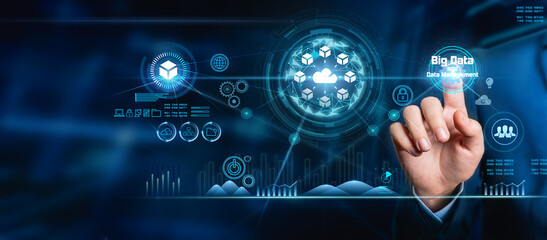 Businessman is holding cloud computing online, connecting to big data analytics. Big data information group sorting Machine learning and Algorithms, Analysis of complex databases, Science, Abstract.