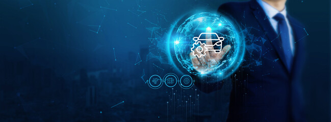 Businessman touch virtual automotive network connection icons. develop people's awareness and spread attention on their automobile needs, resulting in rising growth in the automotive industry
