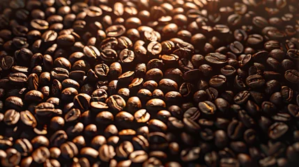 Zelfklevend Fotobehang Koffiebar Top view of the background. Roasted coffee beans with a pleasant aroma. Dark brown grains on a wooden background exposed to sunlight.