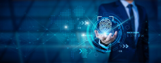 The idea of electronic customer biometric security is an innovation in technology against digital cybercrime. A businessman uses finger-scan identification to access personal security data.  - obrazy, fototapety, plakaty