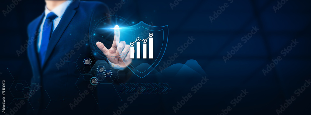 Poster businessman hand touching an analytics shield representing data protection and security. the concept