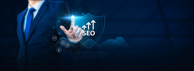 Businessman's hand touching the SEO protection shield with safety network. Safeguarding your online...