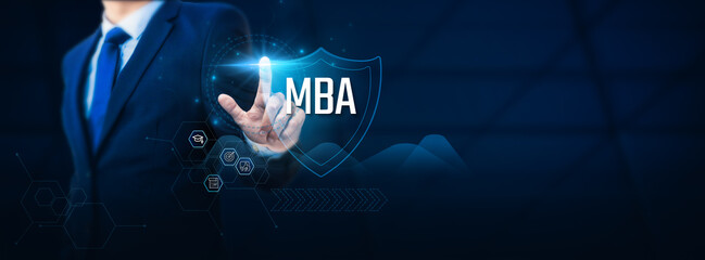 MBA graduate's hand touches the shield of business protection. Business security concept to...