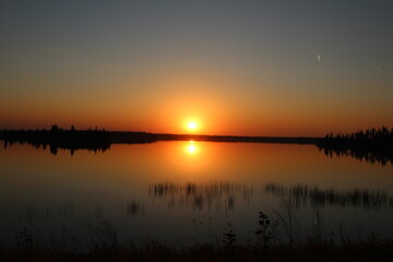 Fototapeta na wymiar sunset over the lake, Elk Island National Park, Alberta