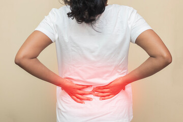 imitative representation of Indian Lady feeling back pain. 