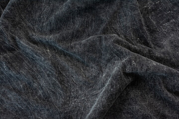 Dark bleached cloth wrinkled crumpled, texture and background 