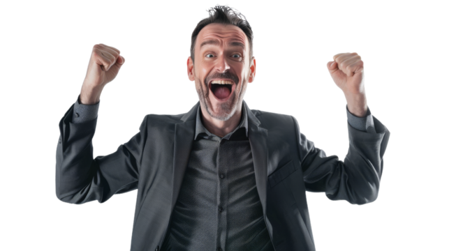 Exuberant businessman in black suit celebrating a victory or success with an ecstatic expression