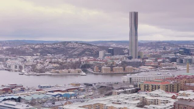 Tall Karlatornet skyscraper in Gothenburg overlooks Gota alv river, aerial pano