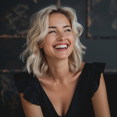 Blonde woman in a black dress exudes charm and happiness with her contagious smile